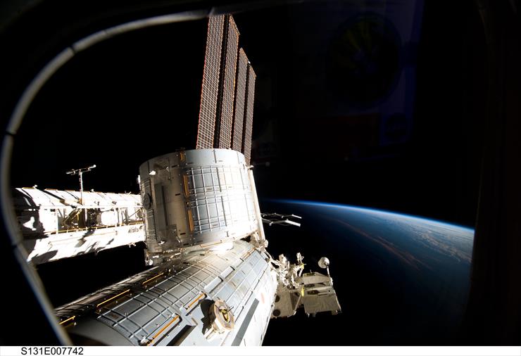   NASA - A Large Space Station Over Earth.jpg